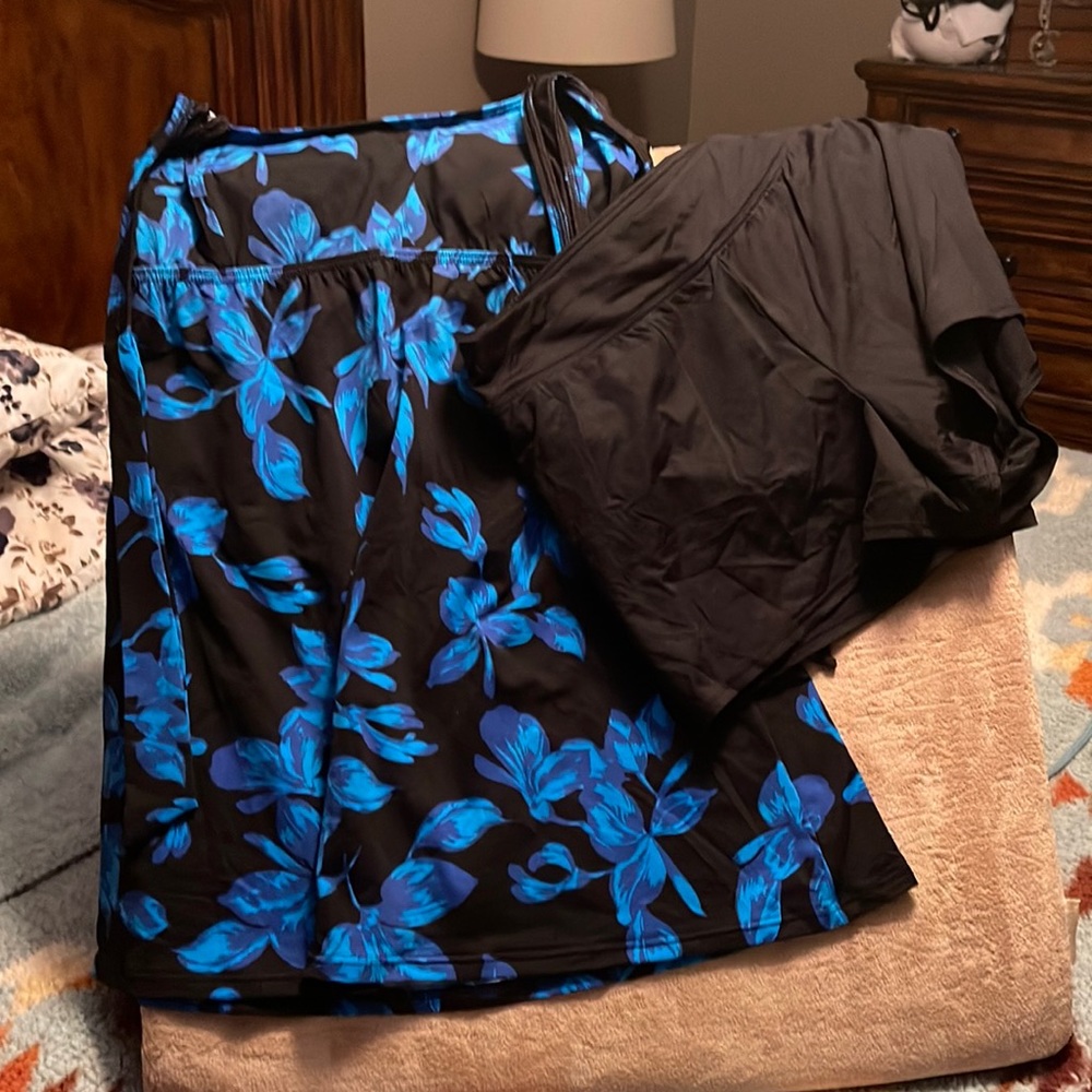 Excellent condition beautiful black with blue flowers and swim short